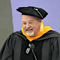 David Reimann giving his address